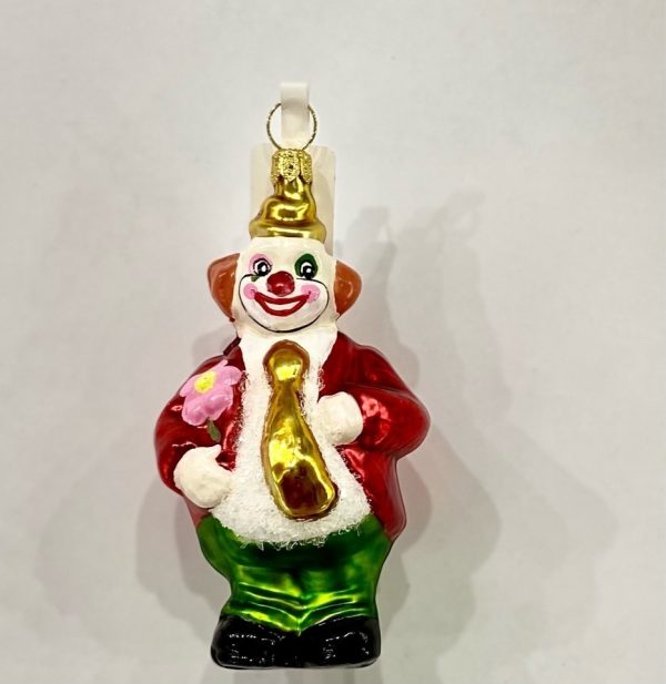 Ёлочная игрушка в виде клоуна с цветком.