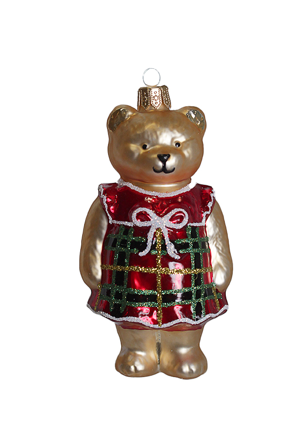 Новогодняя игрушка в виде медведя в красном платье с зелеными клетками и белым бантом.